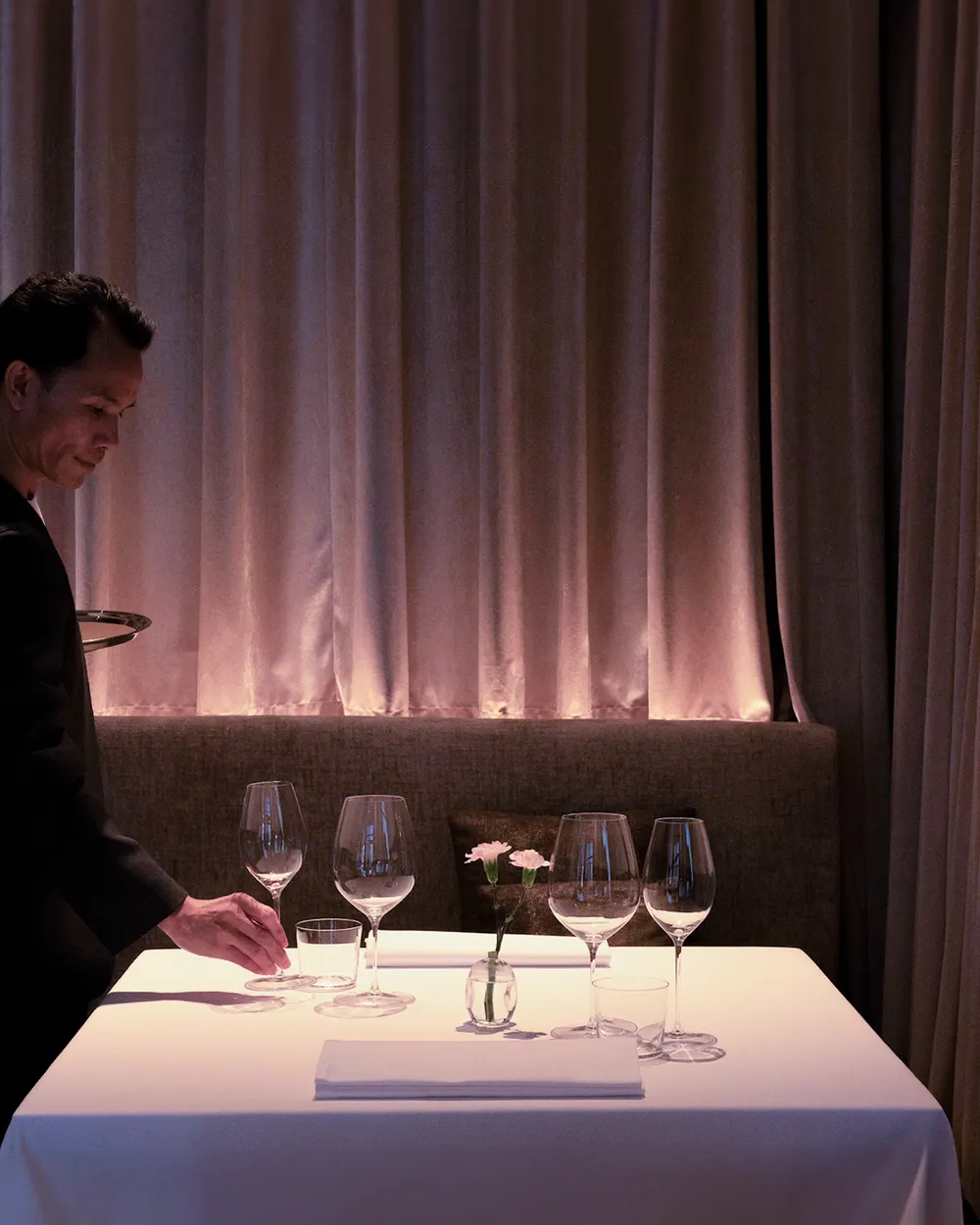 Dining room table by curtain